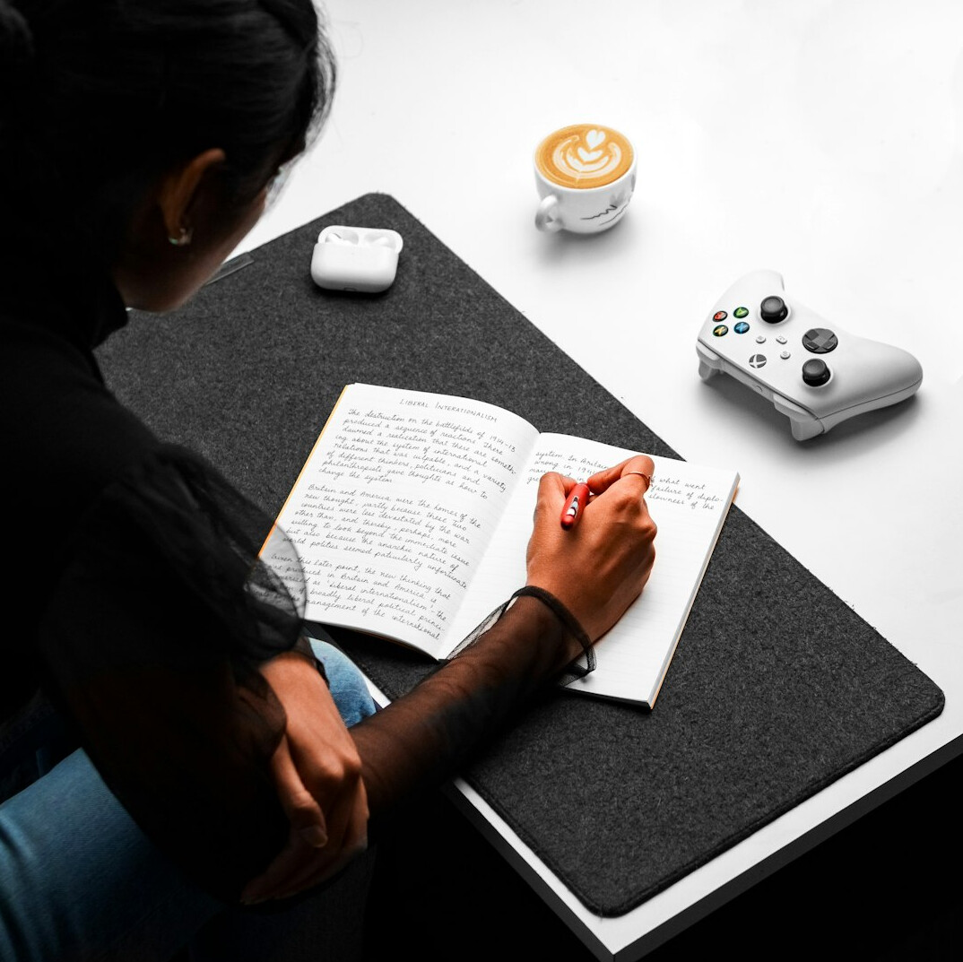 writer at desk with notebook