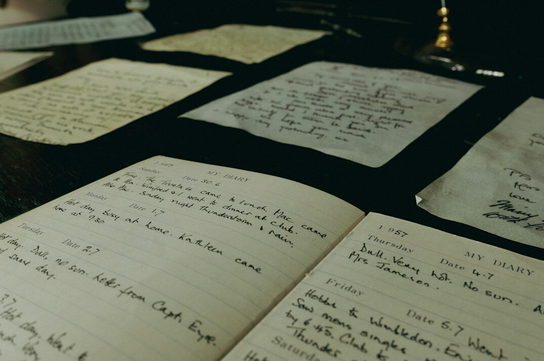 manuscript pages on table