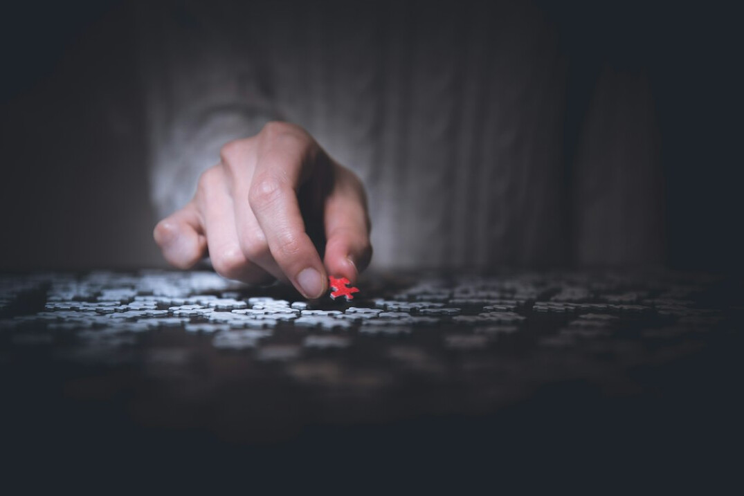 person solving puzzle